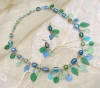 Image of jewlery glass leaves and beads antique looking created and handcrafted by Colette Dowell for Sabu Designs